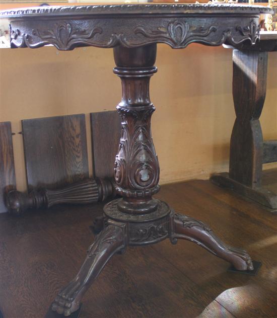 Carved mahogany tripod occ table